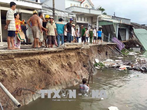 Cần Thơ hỗ trợ 34 hộ dân bị ảnh hưởng do sạt lở bờ sông Ô Môn ảnh 2